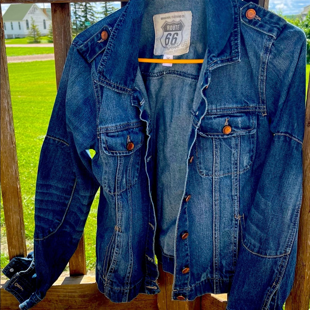 Woman’s used jean jacket. I bought it with the distressed look.  Great shape!